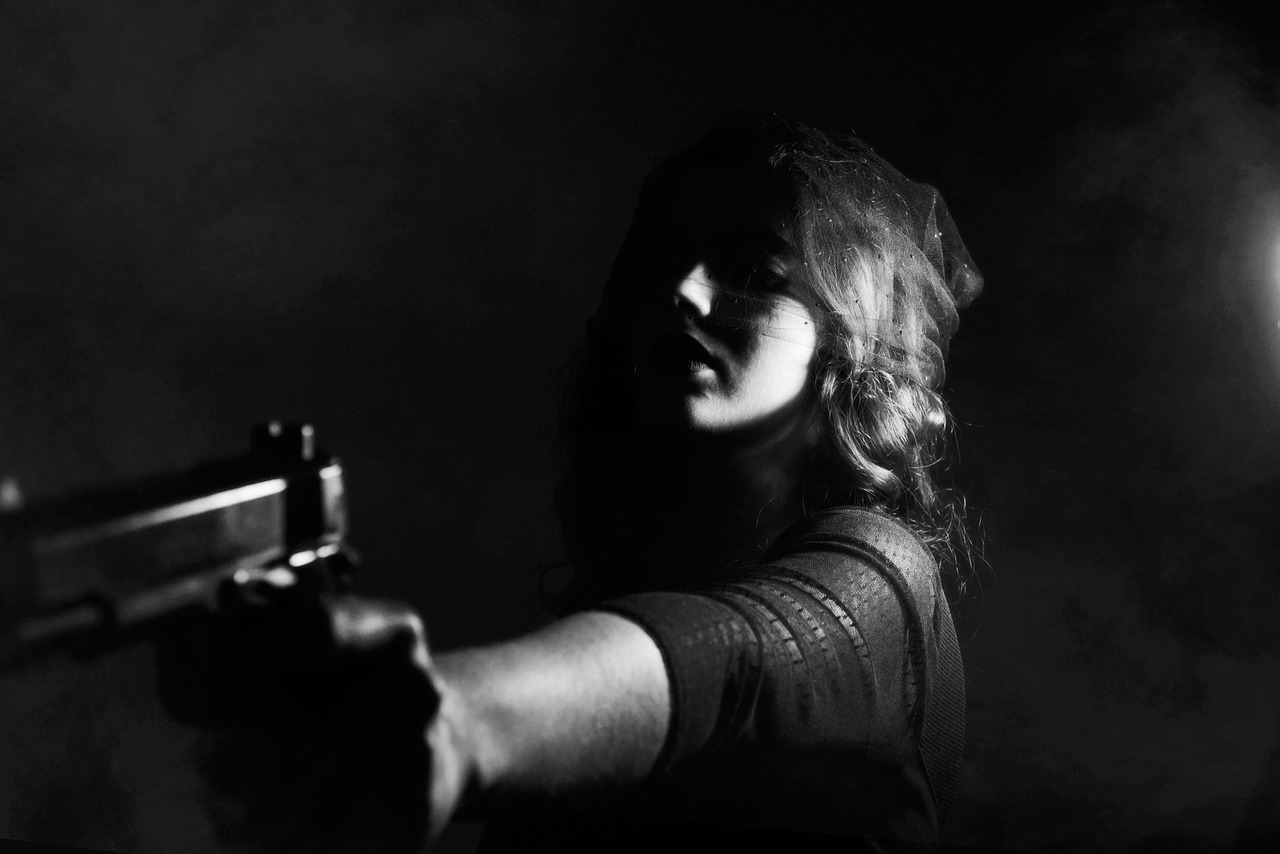 Girl with gun. 